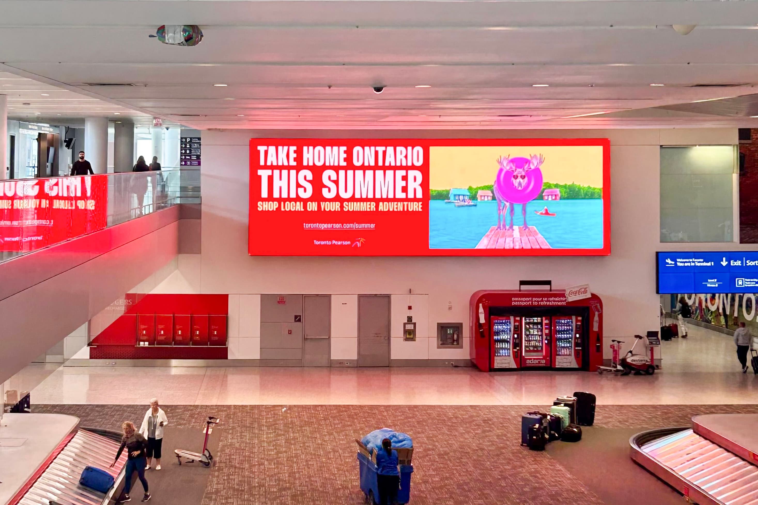 Toronto Pearson's Baggage Carousel Video Wall with the Summer Campaign featured on the screen.